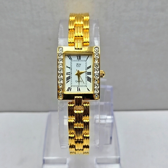 Womens Elizabeth Taylor White Diamonds Gold Crystals Rhinestones New Battery - Picture 1 of 9